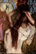 Seated Woman Combing her Hair Edgar Degas